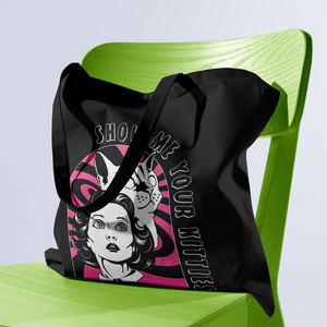 Product image of black Show Me Your Kitties tote bag sitting on bright green wooden chair